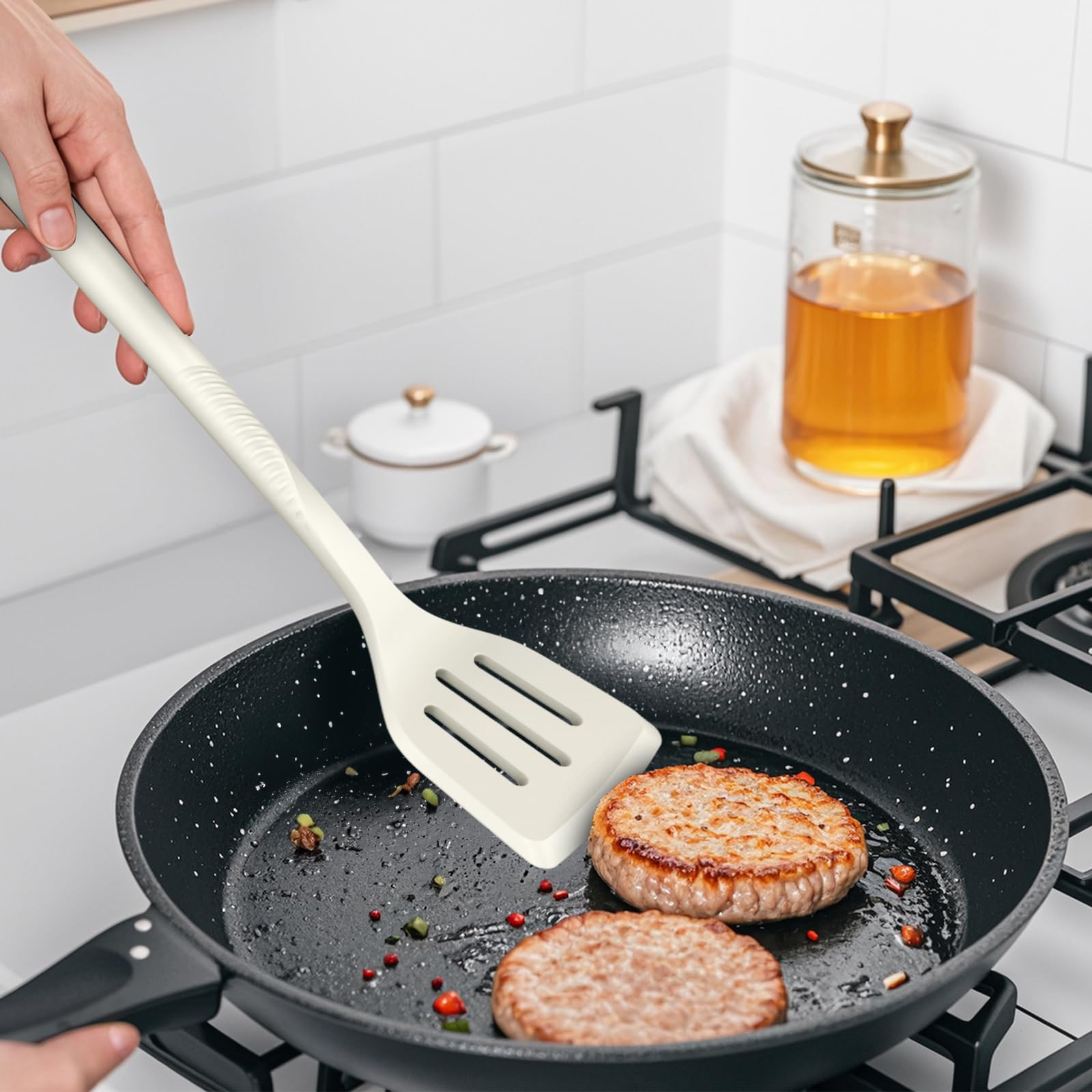 USECANO slotted spoon drains liquids without scratching nonstick cookware.