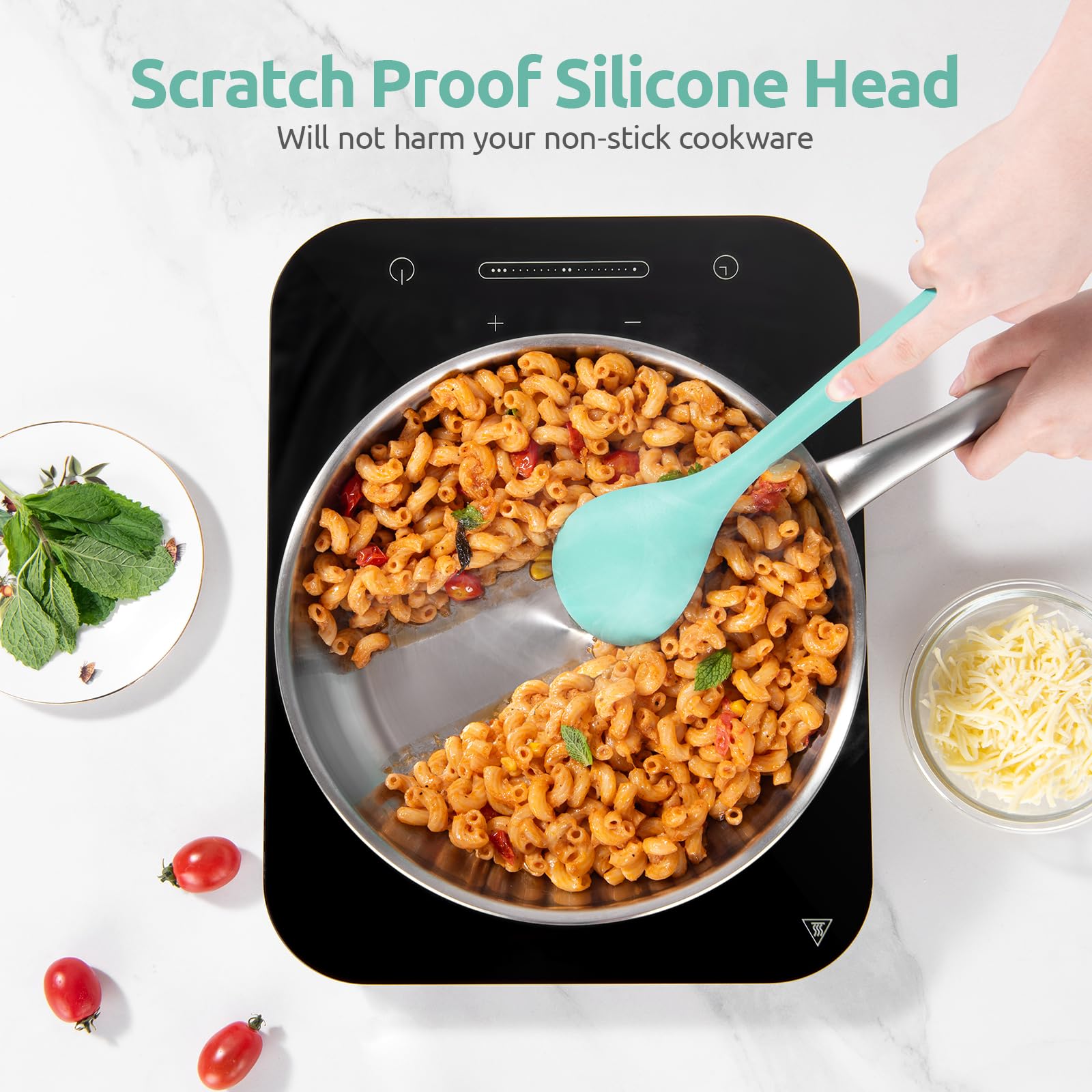 Close-up of U-Taste silicone spoon long handle in Aqua Sky.