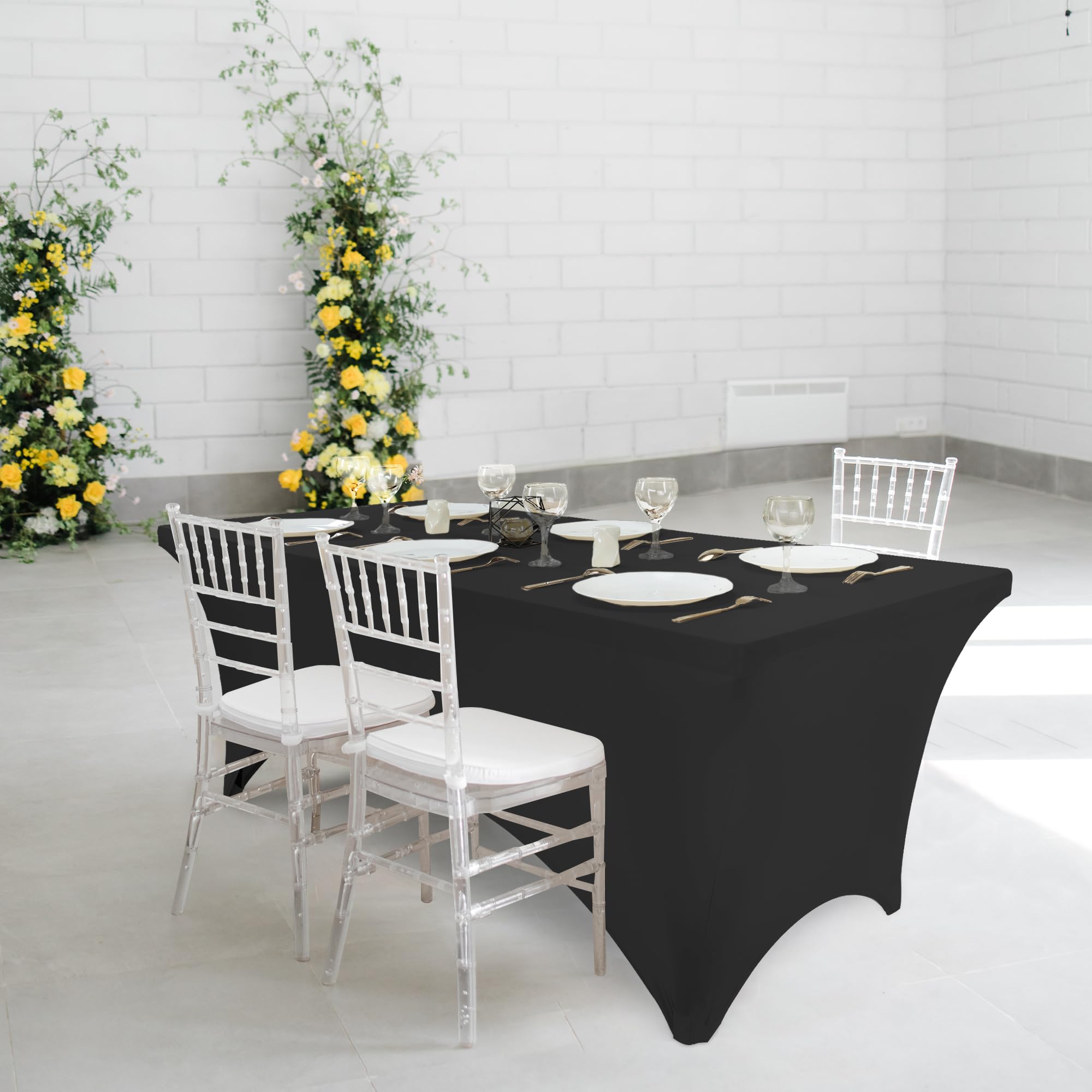 Utopia Kitchen 6ft black spandex tablecloth at a wedding for elegant drape