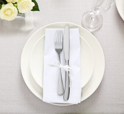 Utopia Kitchen napkins in restaurant setting highlighting hotel-quality fabric.