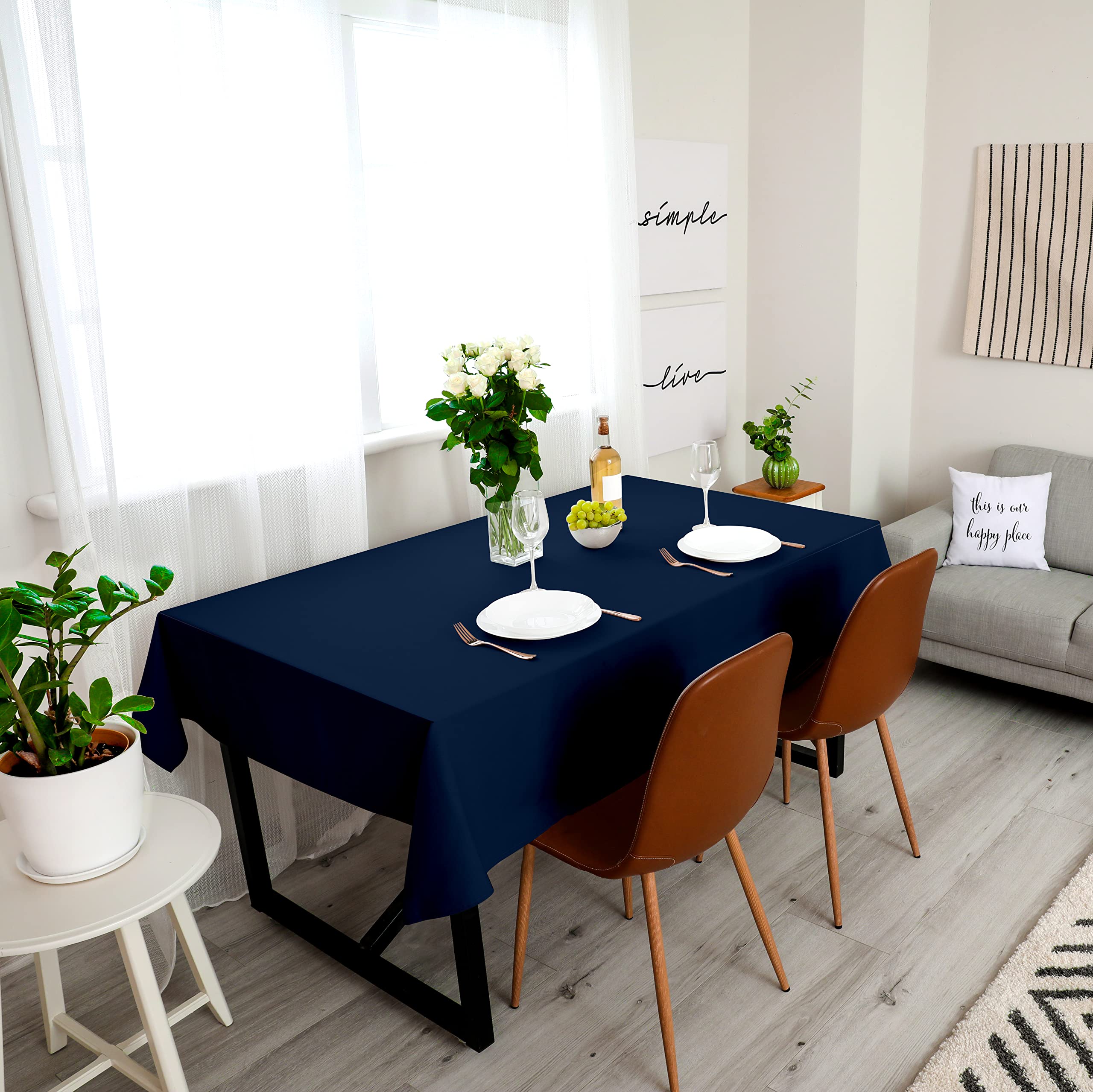 Utopia Kitchen 2-pack rectangle table cloth provides versatile coverage.