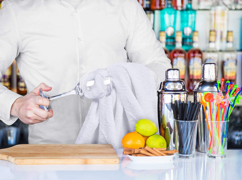 Utopia Towels white bar mops drying dishes and glassware with a luxurious feel.