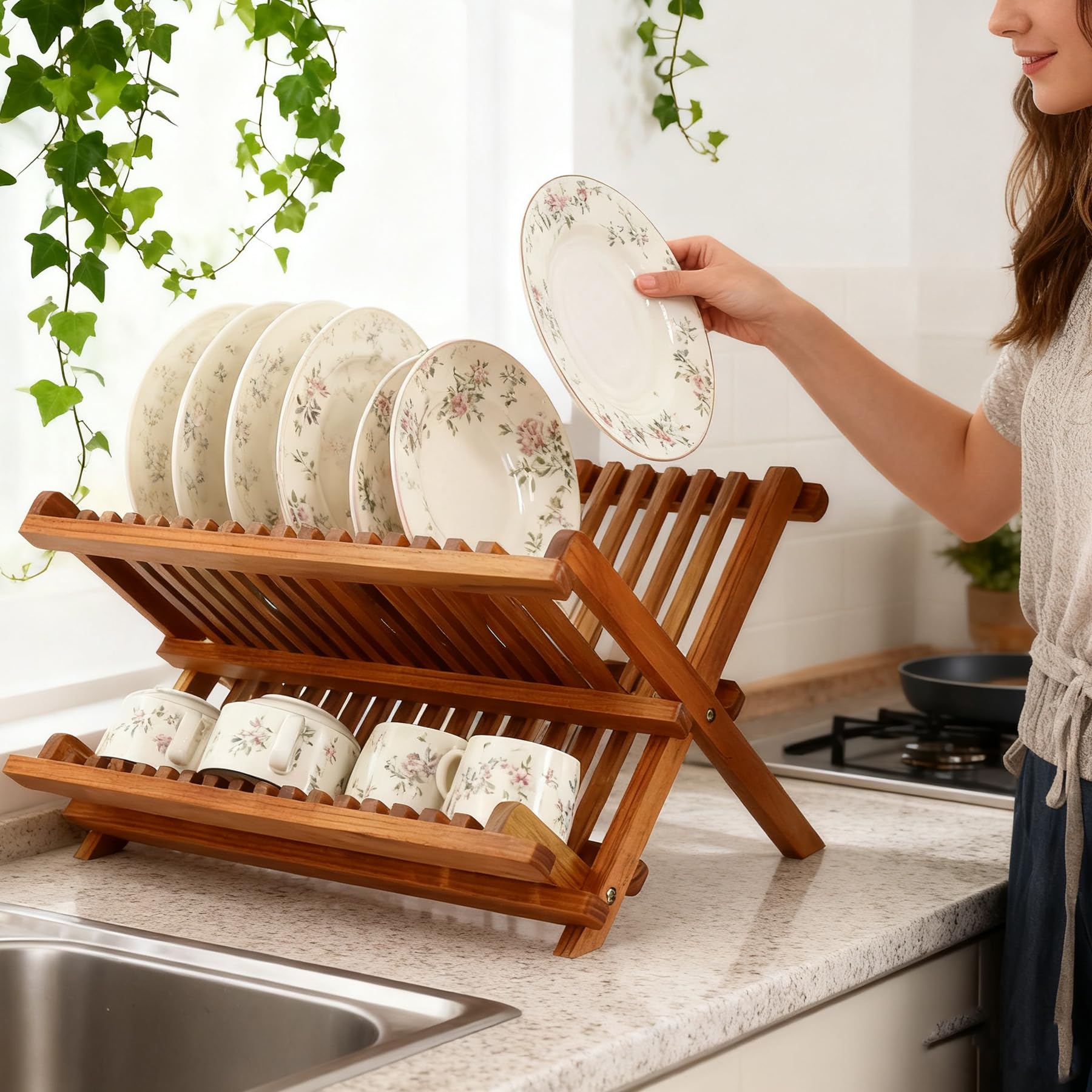 Utoplike teak dish drainer rack folded for compact storage after use.
