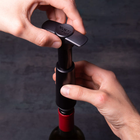 Vacu Vin dining table scene illustrating wine preservation in action
