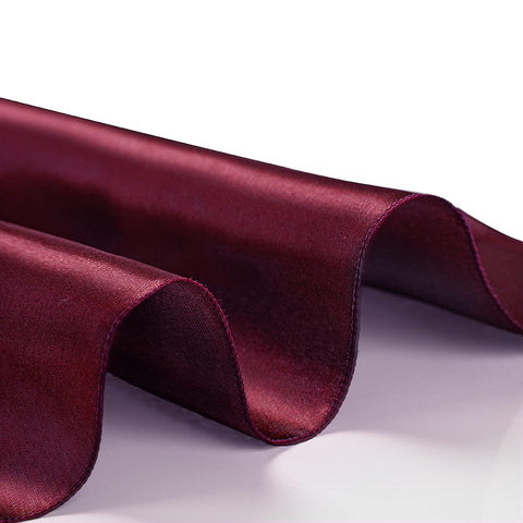 VACVELT Burgundy napkins paired with table runners for a luxury look.