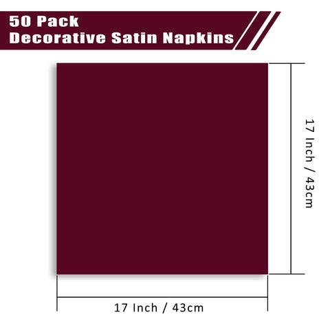 Napkins beside a wedding table setting with a charger and burgundy color.