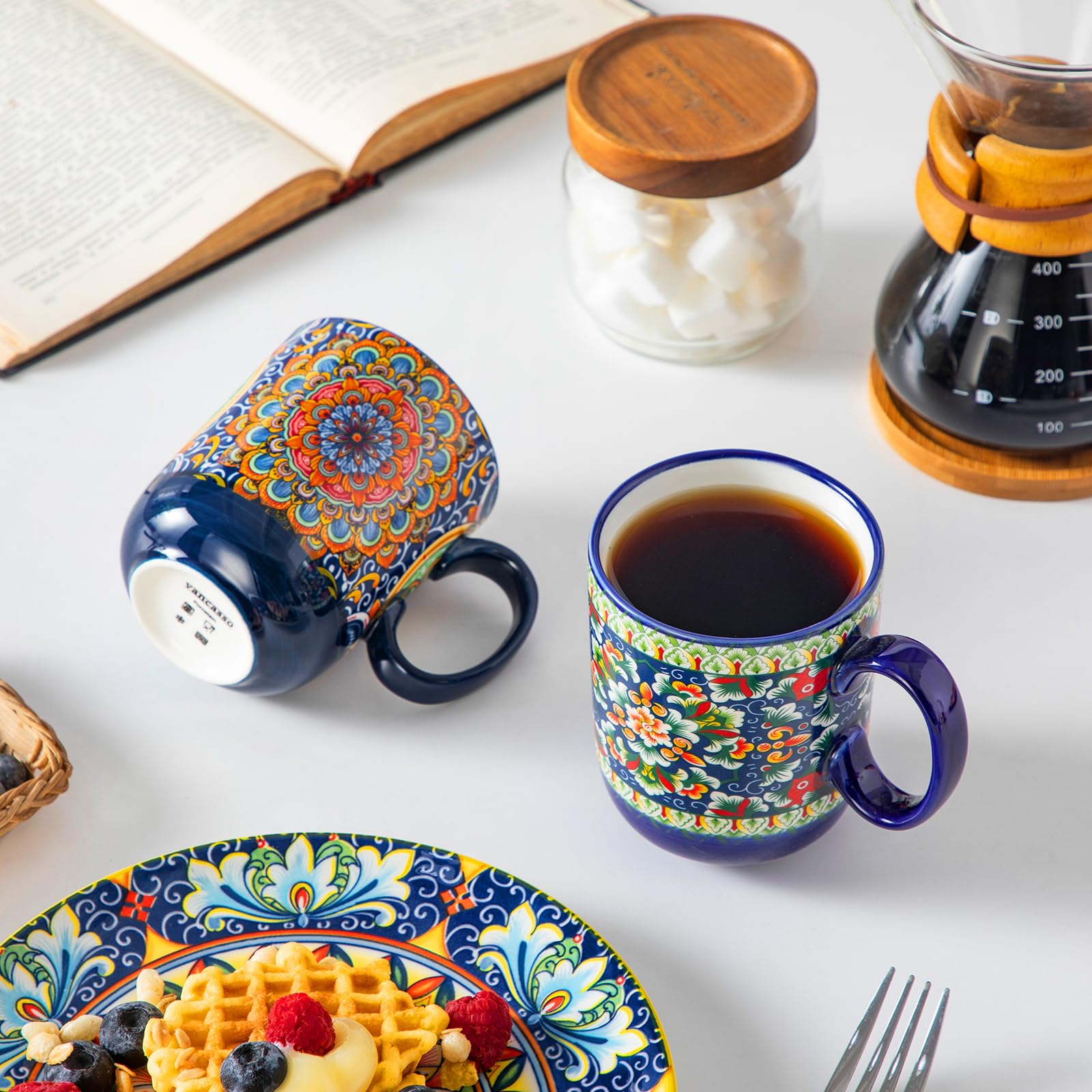 Vancasso Boho coffee mugs with petal pattern, elegant centerpiece for guests.