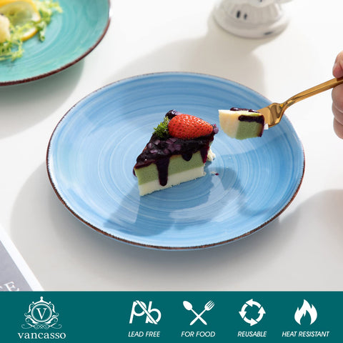 Brown eyelash rim on Bonita Blue plates provides artistic detail