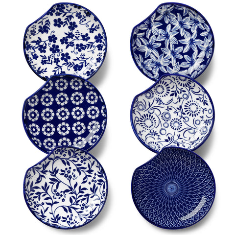 Vancasso ceramic spoon rest on stovetop with blue white floral pattern keeps counters tidy