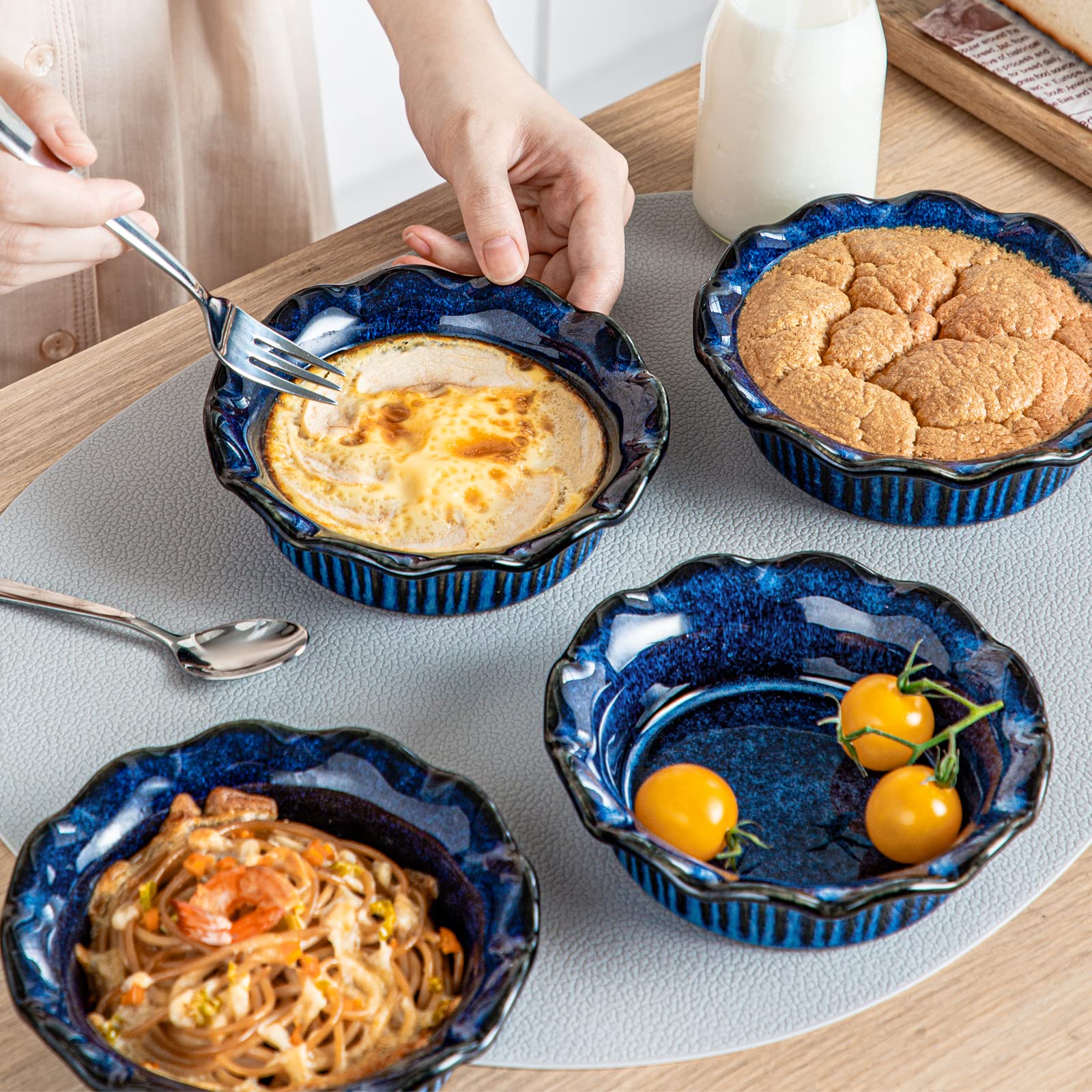 Rustic blue finish from Vancasso adds charm to kitchen and table.