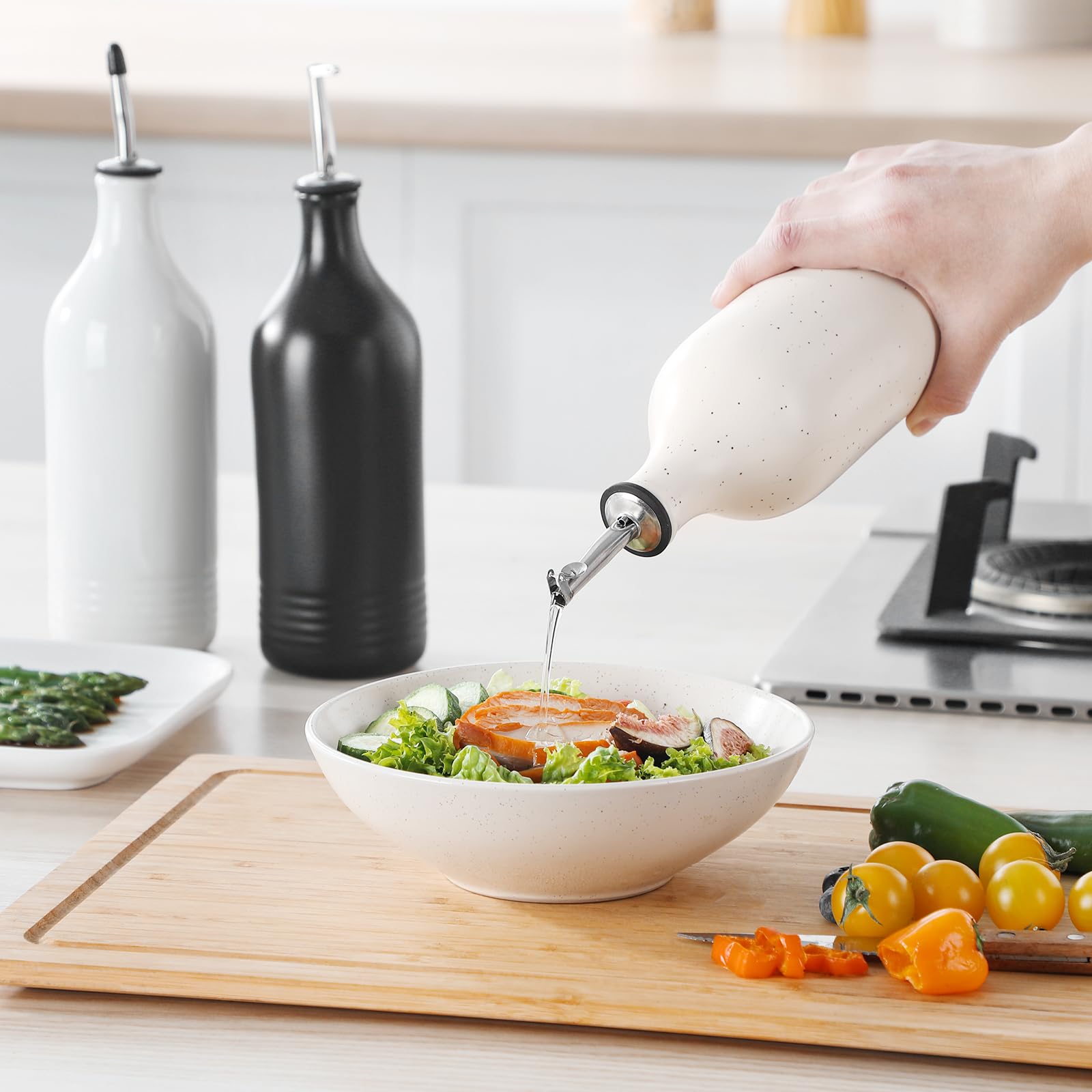 Vancasso 20oz capacity dispenser reduces refills during cooking.
