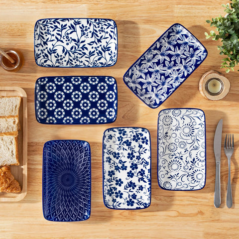Modern kitchen decor complements vintage blue-white motif of Selene plates