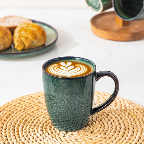 Vancasso STARRY mugs feature a minimalist green glaze
