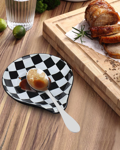 Porcelain VanlonPro spoon rest offers heat resistance for hot utensils.