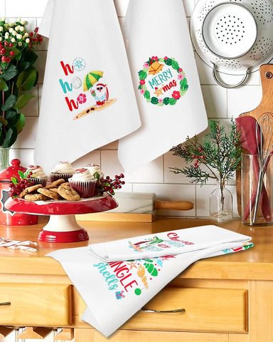 Vansolinne Coastal dish towels with wave patterns brighten drying and hand-wipe tasks.