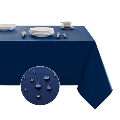 Veblandy navy tablecloth 52x70 protects surfaces during meals.