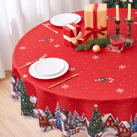 VEDACHIC tablecloth shows snowmen and reindeer border, enhancing cozy indoor celebrations.