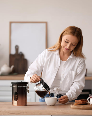 Veken copper finish canister adds elegant countertop storage with practical design.