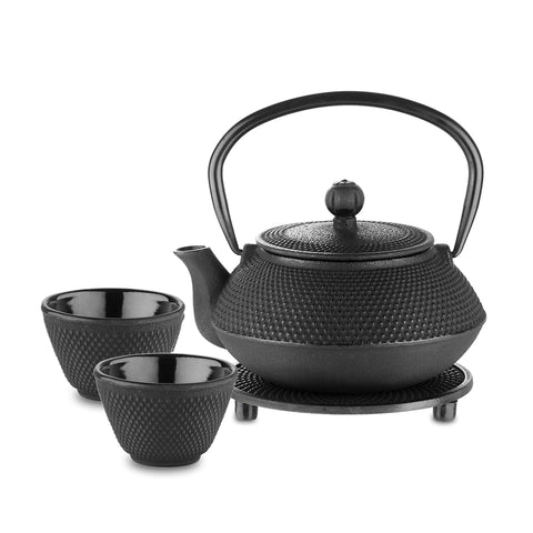 Velaze cast iron teapot with hammered design for even heat and aroma.