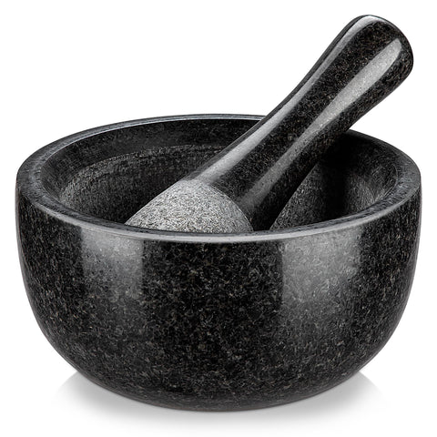 Velaze granite mortar and pestle with 580ml capacity for efficient herb grinding.