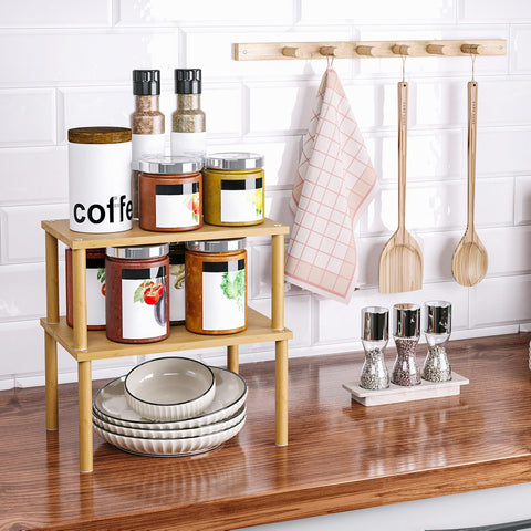 VERTORGAN spice bottles on bamboo rack for easy access.