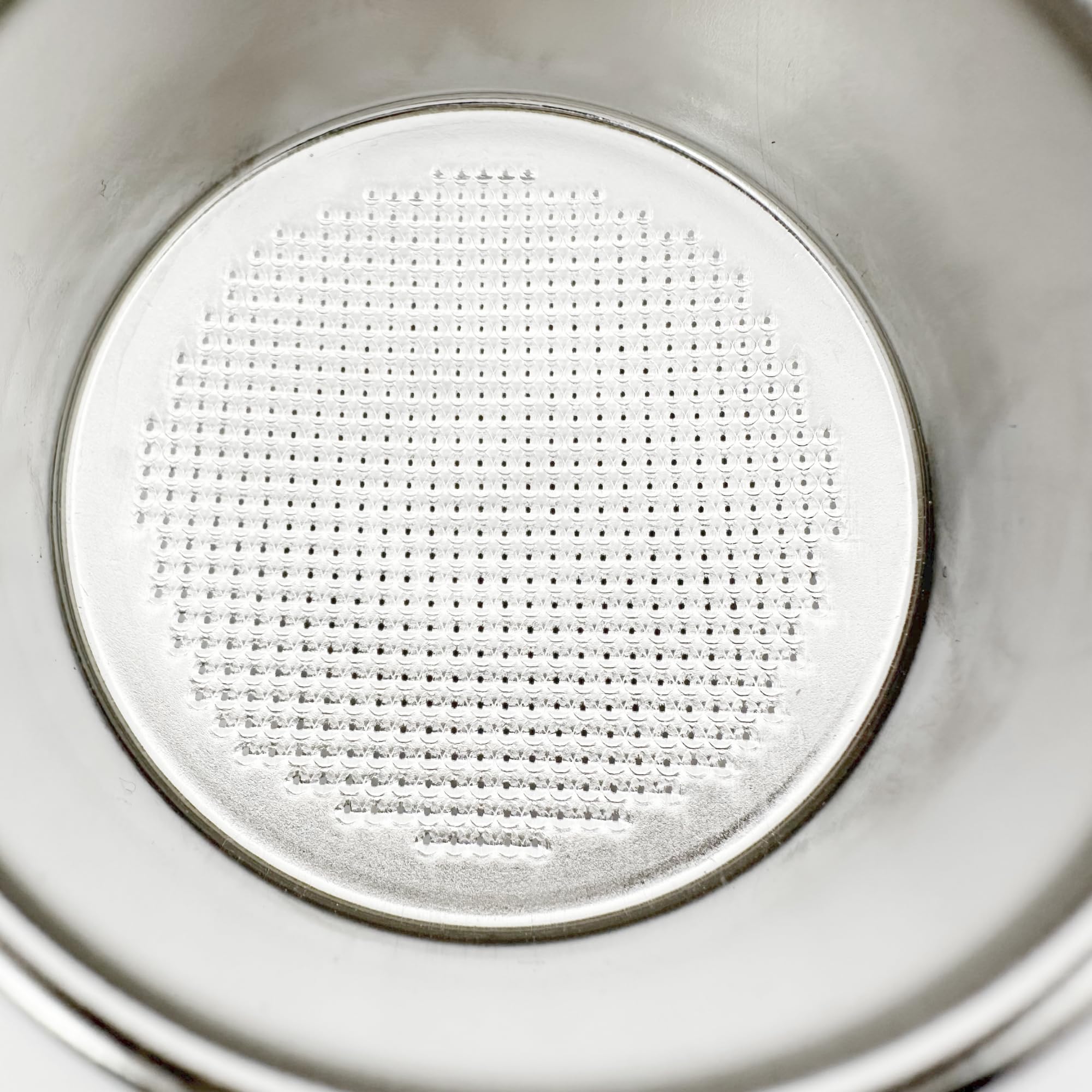 Verybarista convex-basket-hole-pattern promotes balanced water flow and extraction.