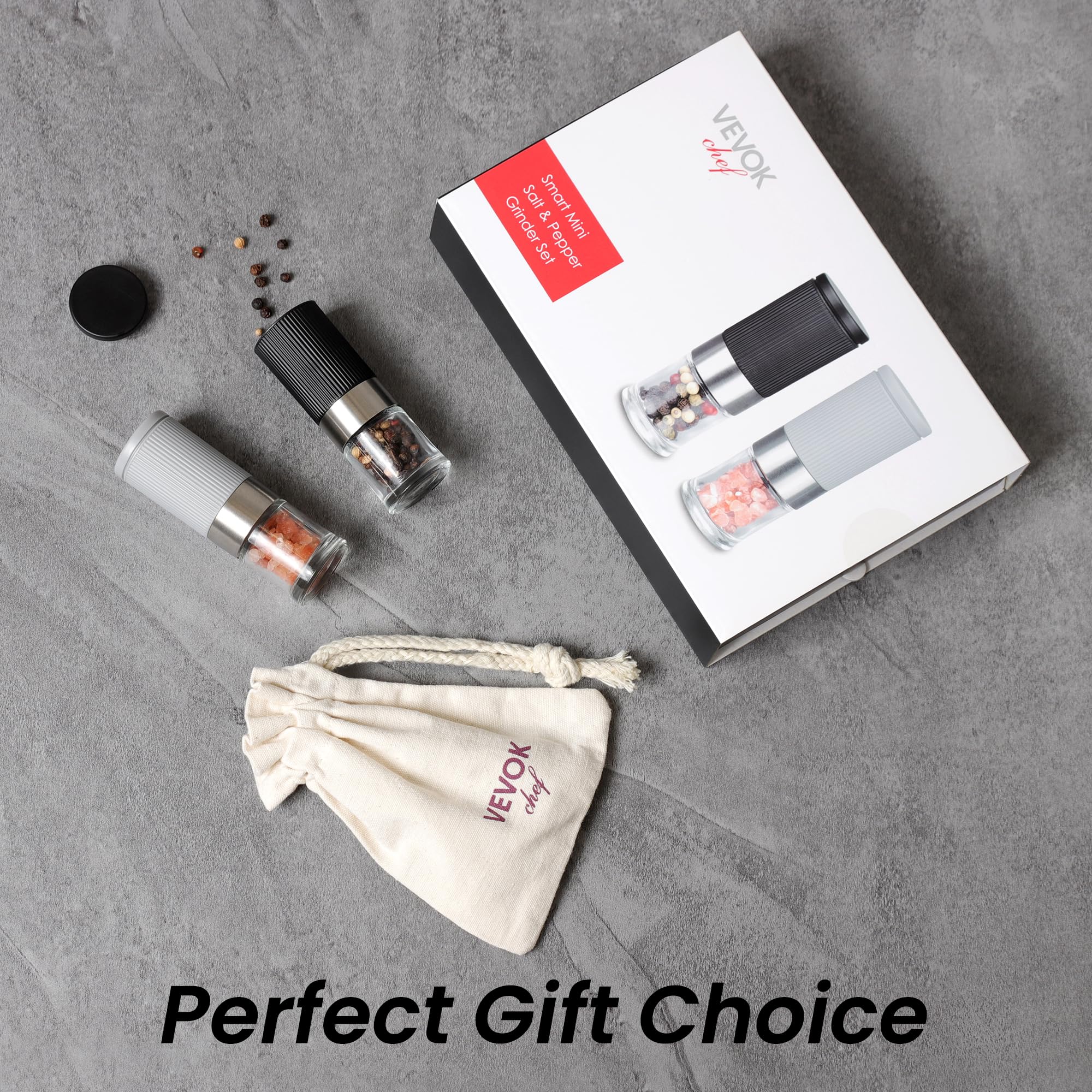 VEVOK CHEF compact pepper mills in hand, demonstrating travel-friendly size.