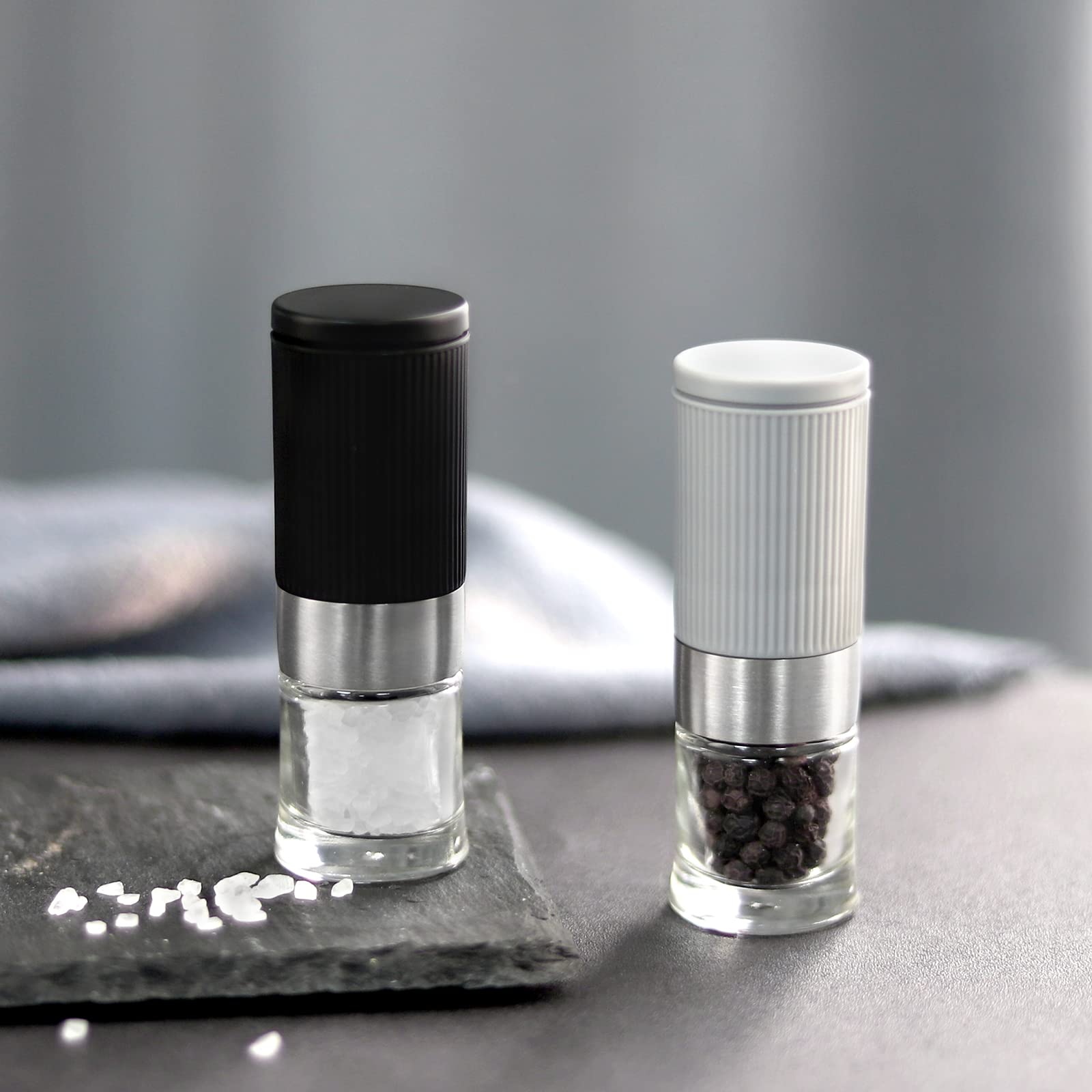 VEVOK CHEF spice grinders in use at outdoor table, ready for fresh flavor.
