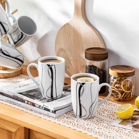VEWEET Fiona mugs being loaded into a dishwasher for easy cleanup.