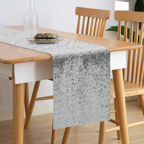 VHH glitter sequin runner in silver brightens holiday and wedding tables.
