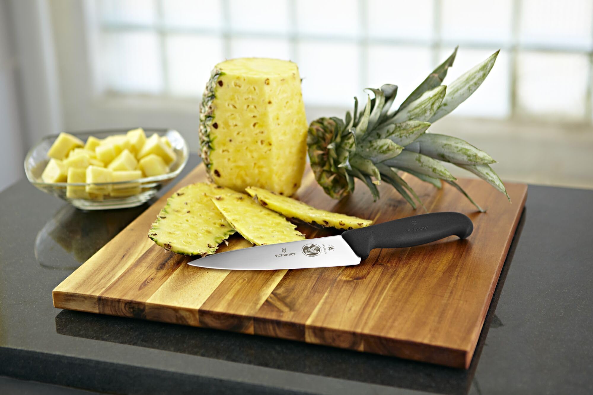 Victorinox Fibrox 6-Inch Knife 15 cm blade versatile for meat, vegetables, and fruit.