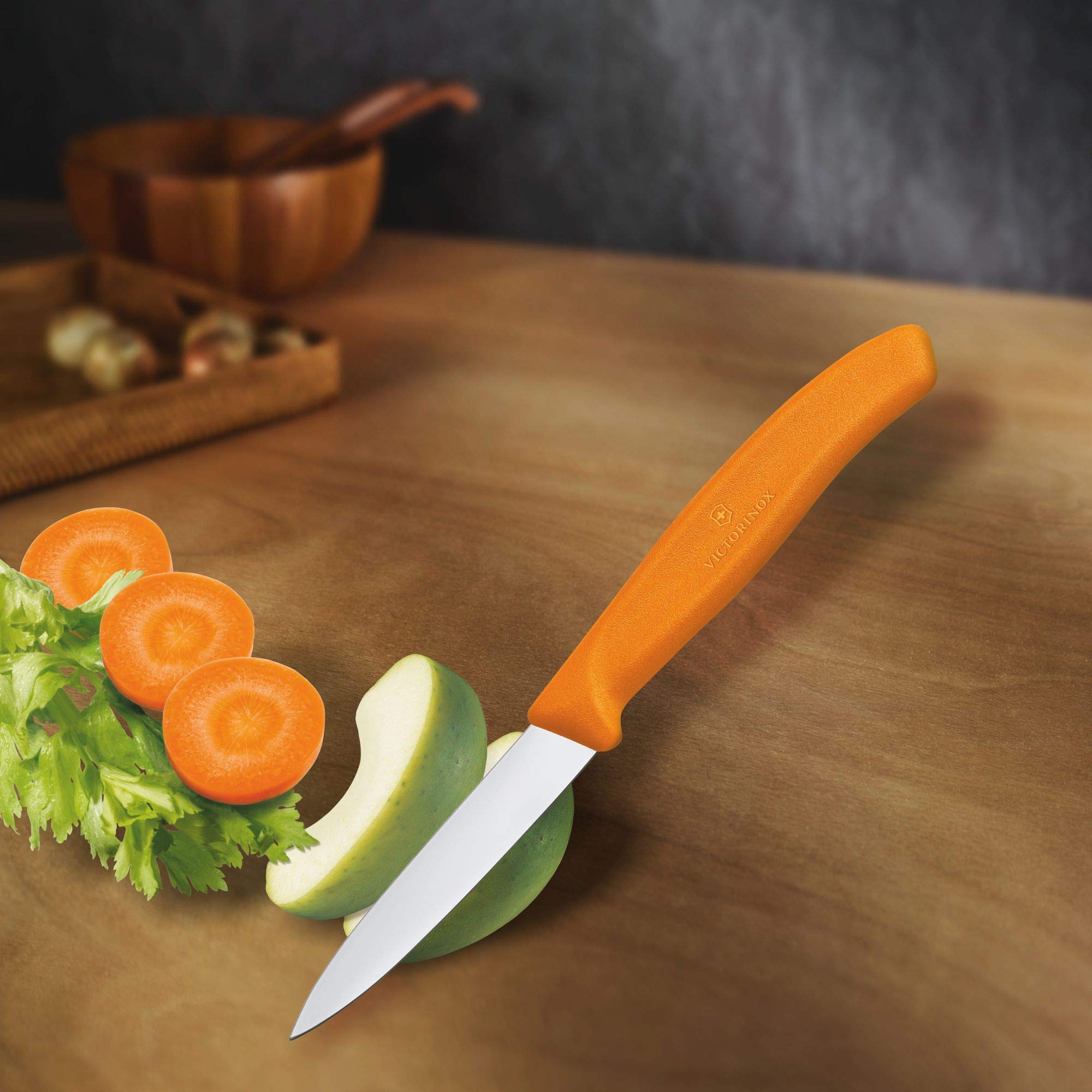 Compact Victorinox paring knife used for delicate garnishes.