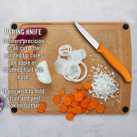 Victorinox paring knife in orange for garlic and herb prep.