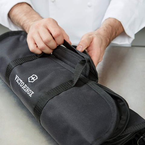 Contents of Victorinox Field Dressing Kit spread for field tasks