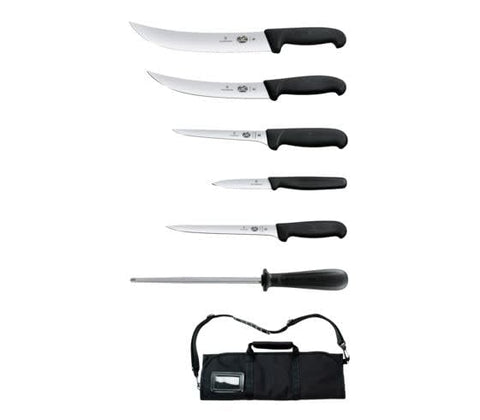 Victorinox Field Dressing Kit tools laid out for field use