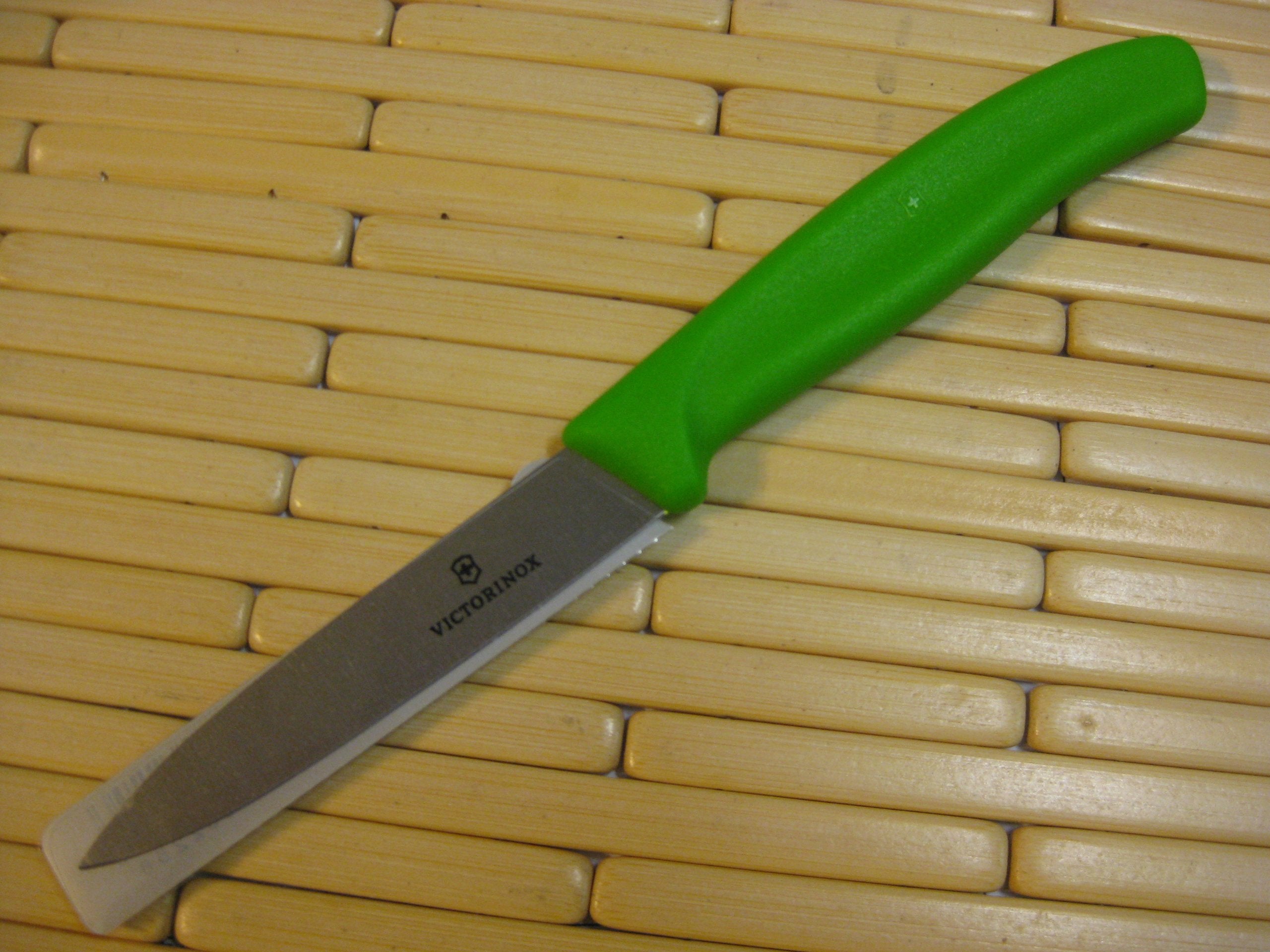 Victorinox Swiss Classic paring knife with green handle enables delicate trimming and garnishing