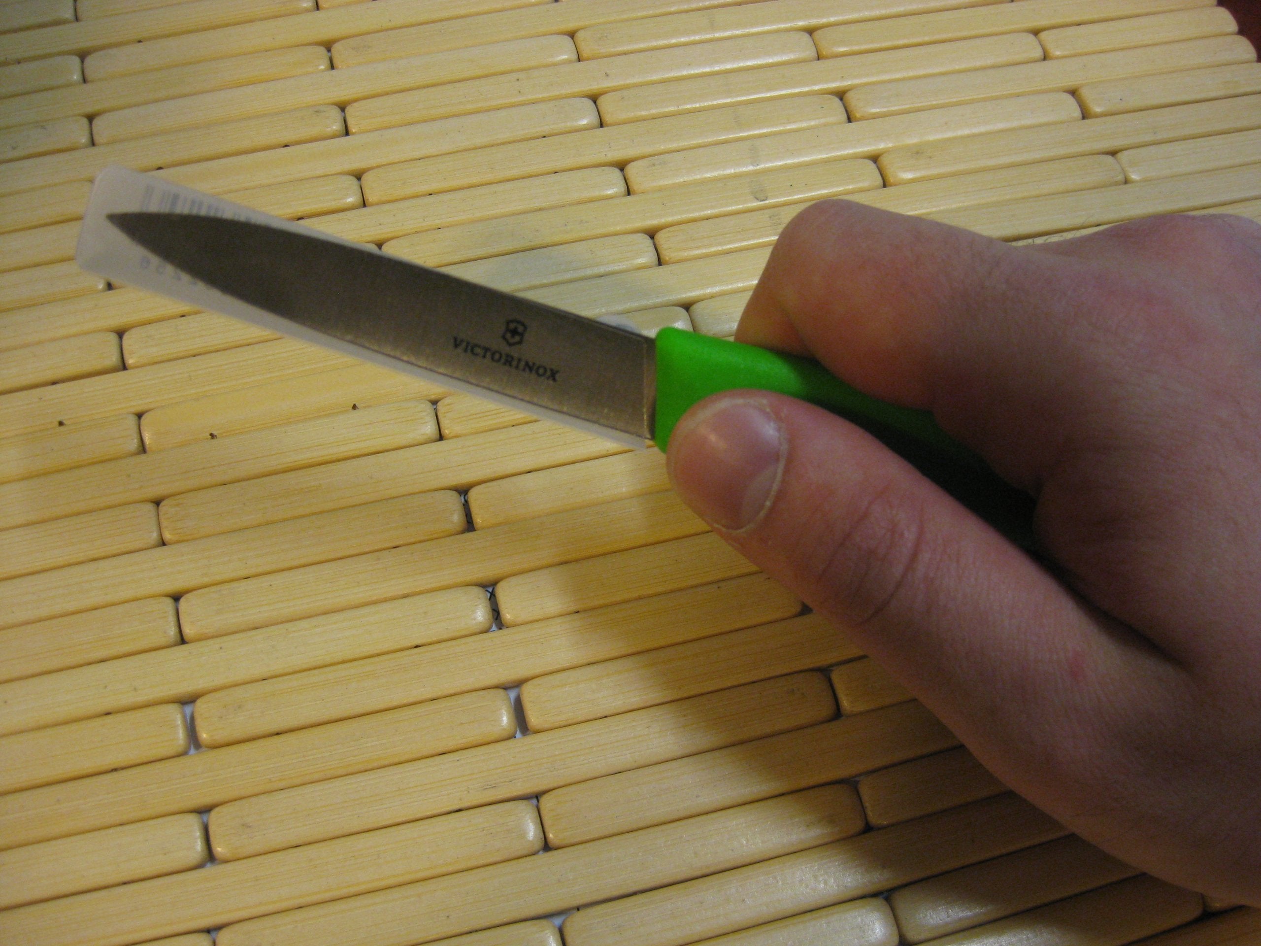 Victorinox Swiss Classic spear-point paring knife for intricate cuts with green handle