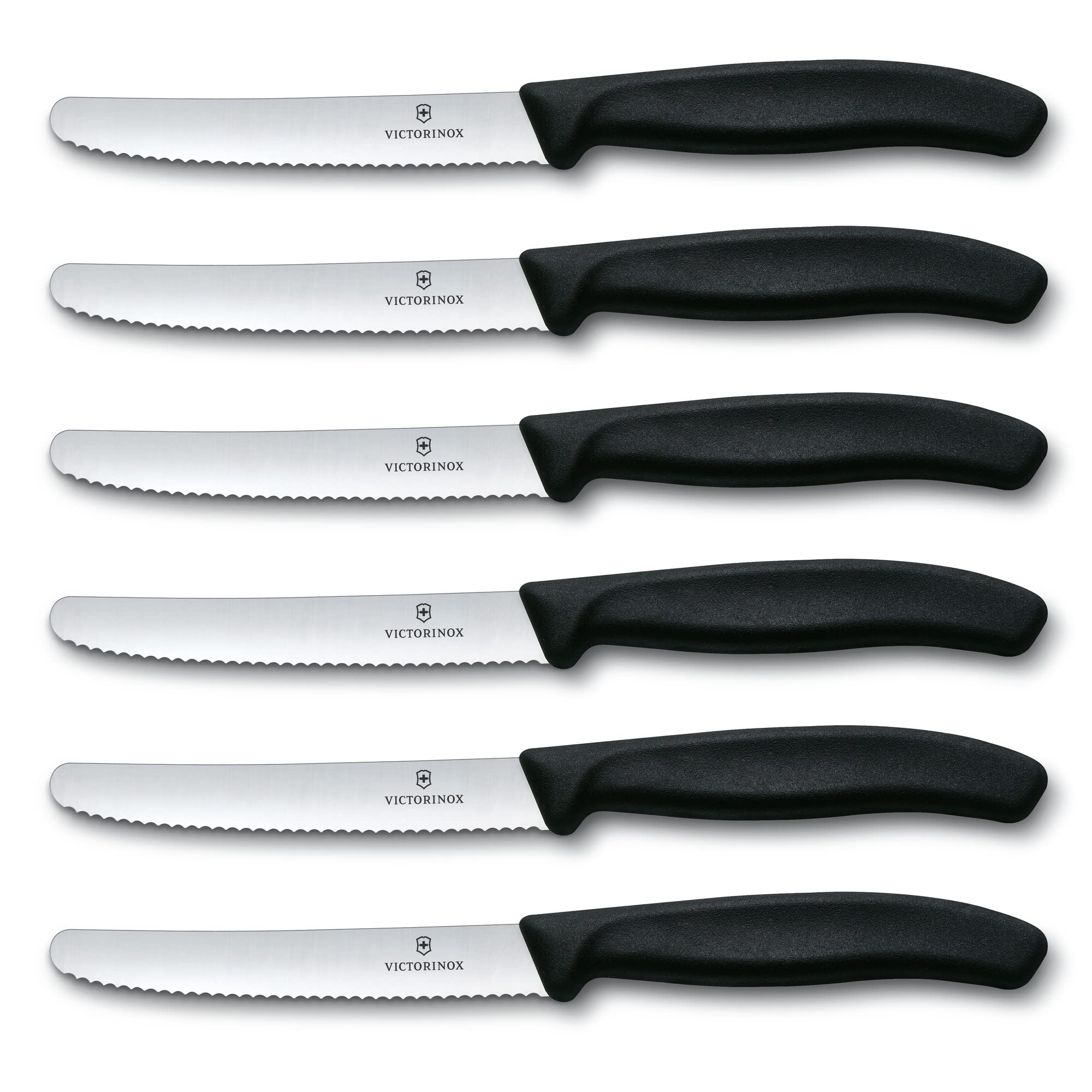 Close-up of Victorinox Swiss Classic serrated blade showing sharp edge