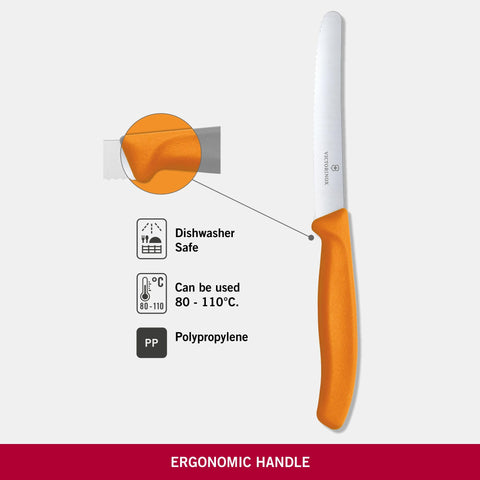 Victorinox Swiss Classic orange handle close-up, ergonomic grip for comfortable kitchen prep.