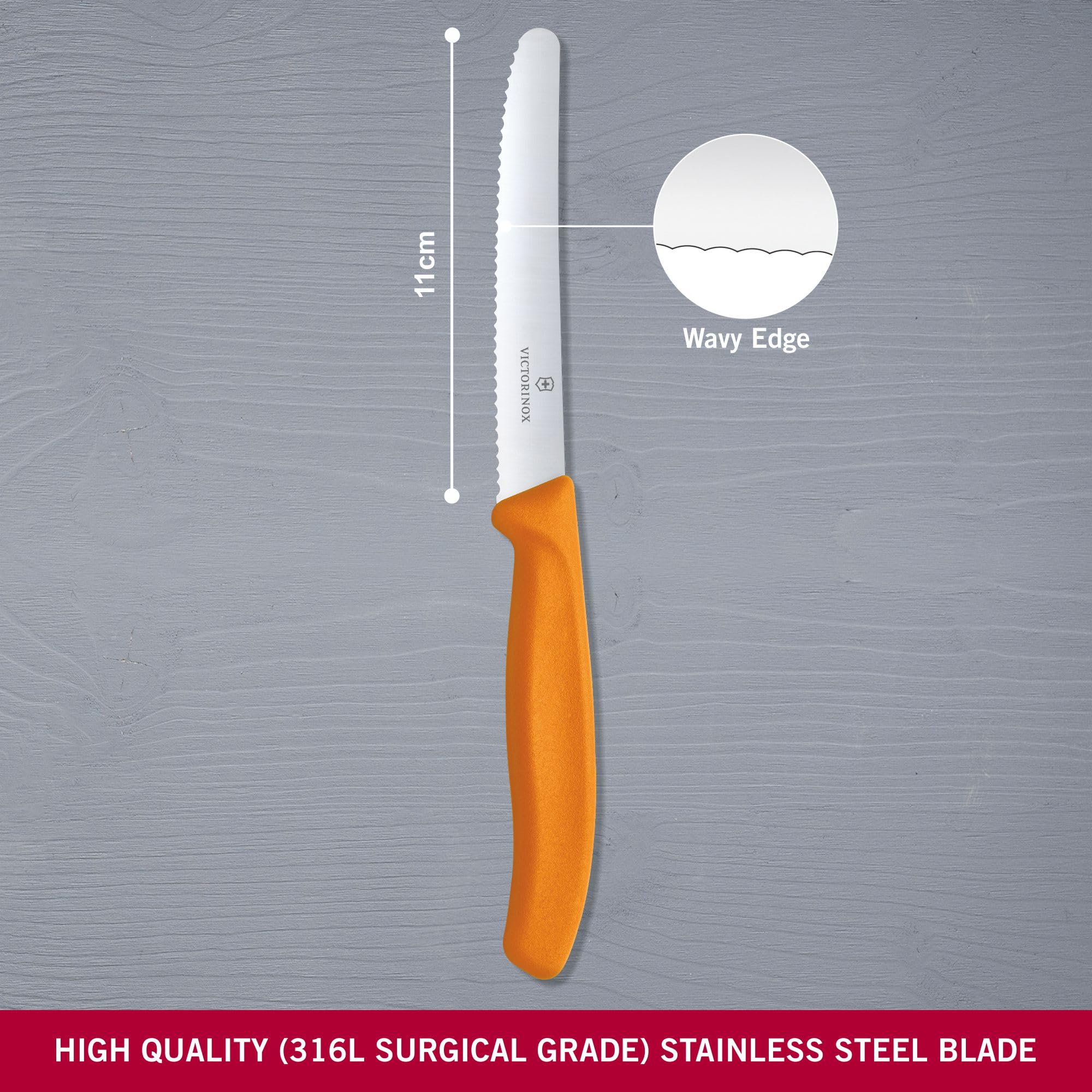 Victorinox Swiss Classic Utility serrated edge close-up, rugged blade for packaging and rope tasks.