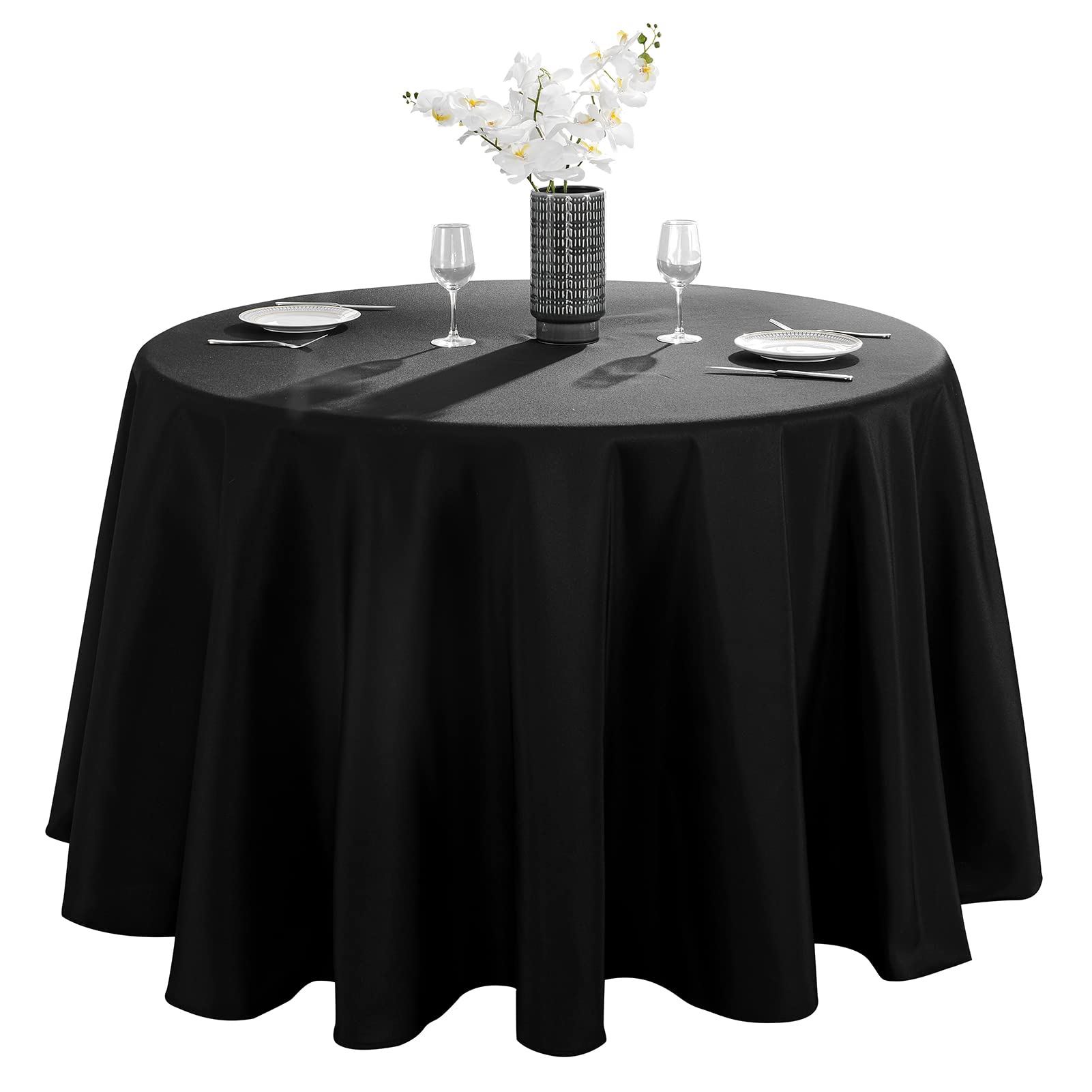 VidaFete 90-inch round black tablecloth on an elegant dining table for easy cleanup.