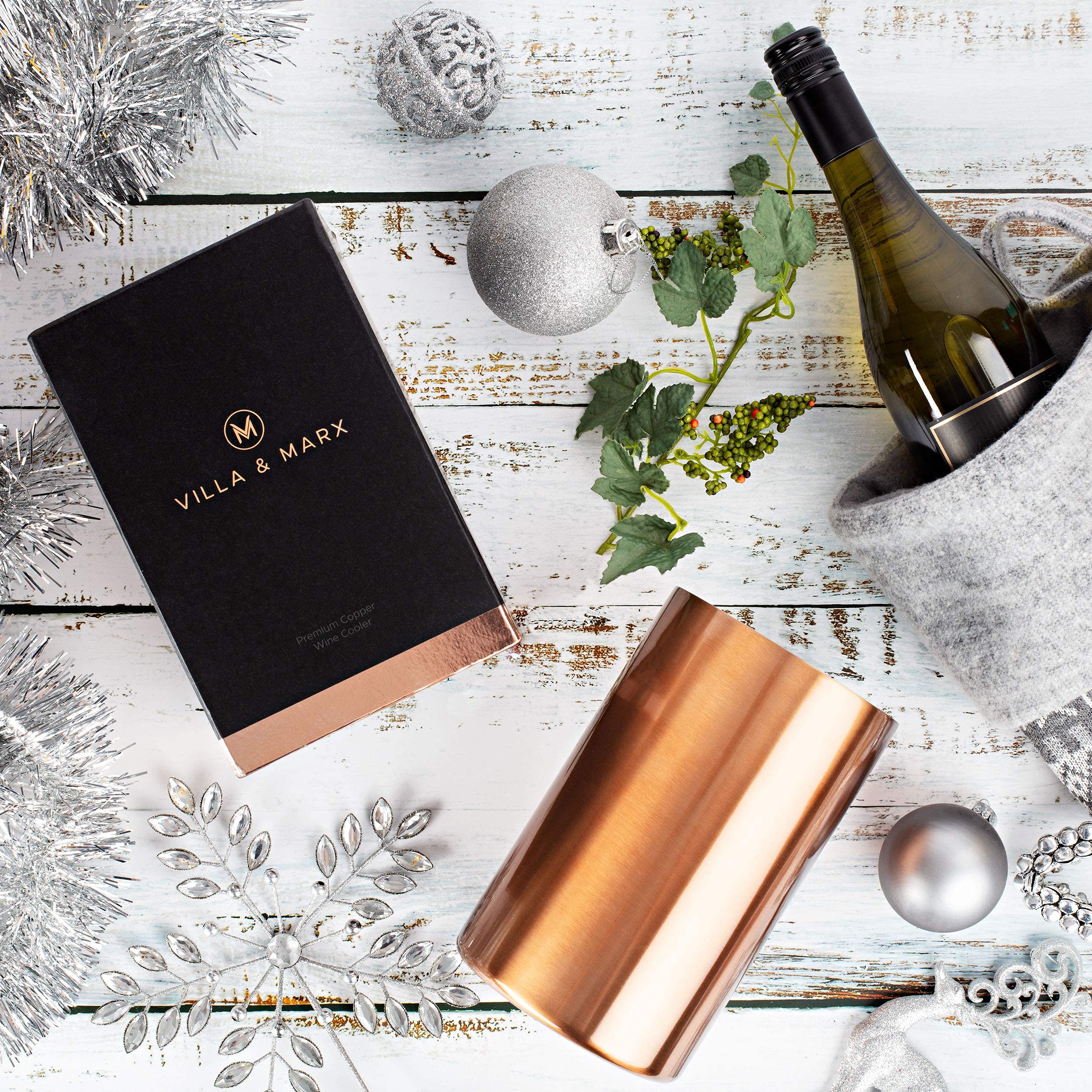 Villa & Marx wine chiller on a kitchen counter with bottle ready to chill.