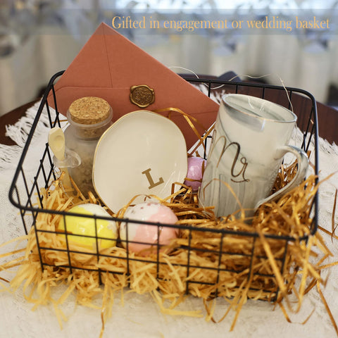 VINCOMIC monogram ring dish with gold trim highlights a personalized gift idea.