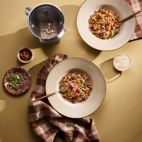 Vitamix container promotes a smooth vortex for consistent results.