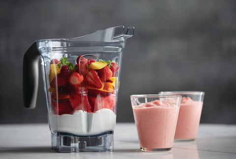 Vitamix 64oz container lid plug shows measurement lines for accuracy