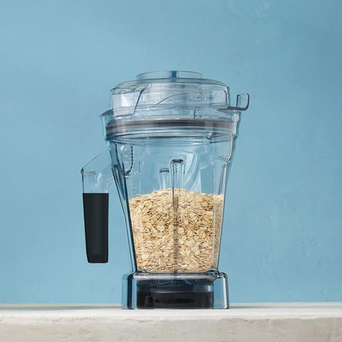 See-through lid of Vitamix container for monitoring and ingredient addition during blending
