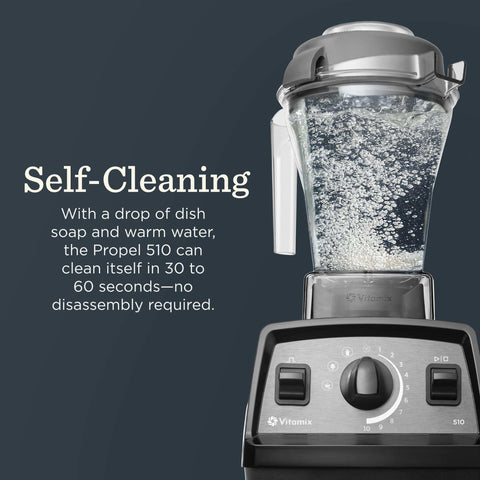 Close-up of Vitamix Propel 510 stainless-steel blades slicing through ice