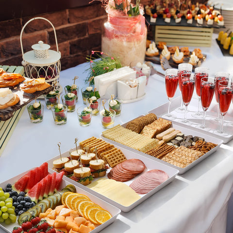 VITEVER large trays display desserts and drinks for a polished table setup.