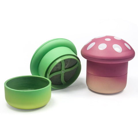 VOVOH mushroom grinder held in hand showing portable design for tea and spices.