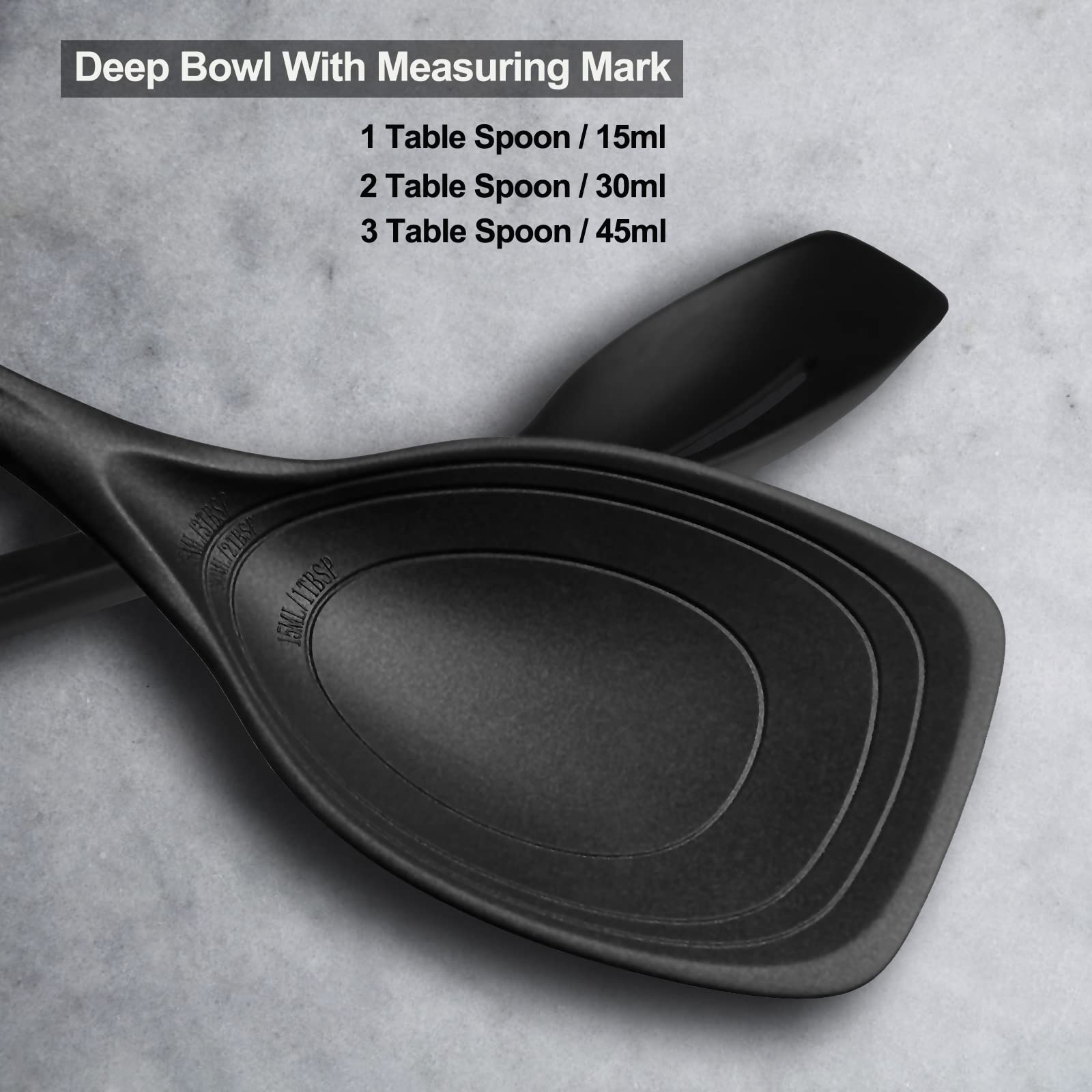 Vovoly solid spoon with embossed marks for quick measurement.